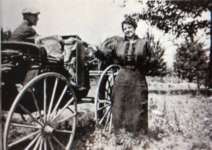 A picture containing outdoor, carriage, old, horse-drawn vehicle

Description automatically generated